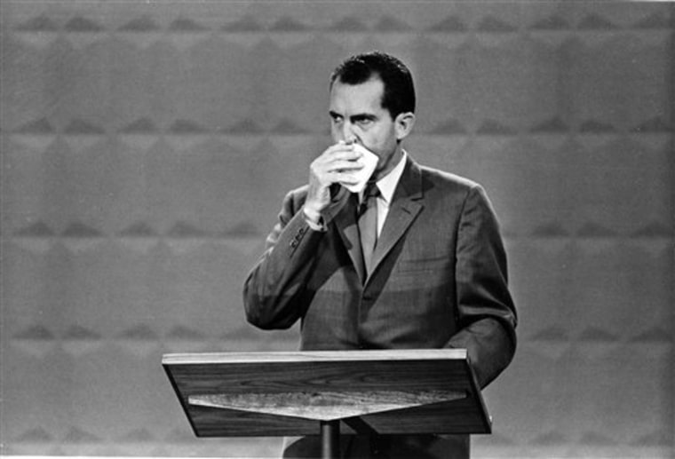 Richard M. Nixon wipes his face with a handkerchief during the nationally televised debate with John F. Kennedy, in Chicago, Ill., Sept. 26, 1960.